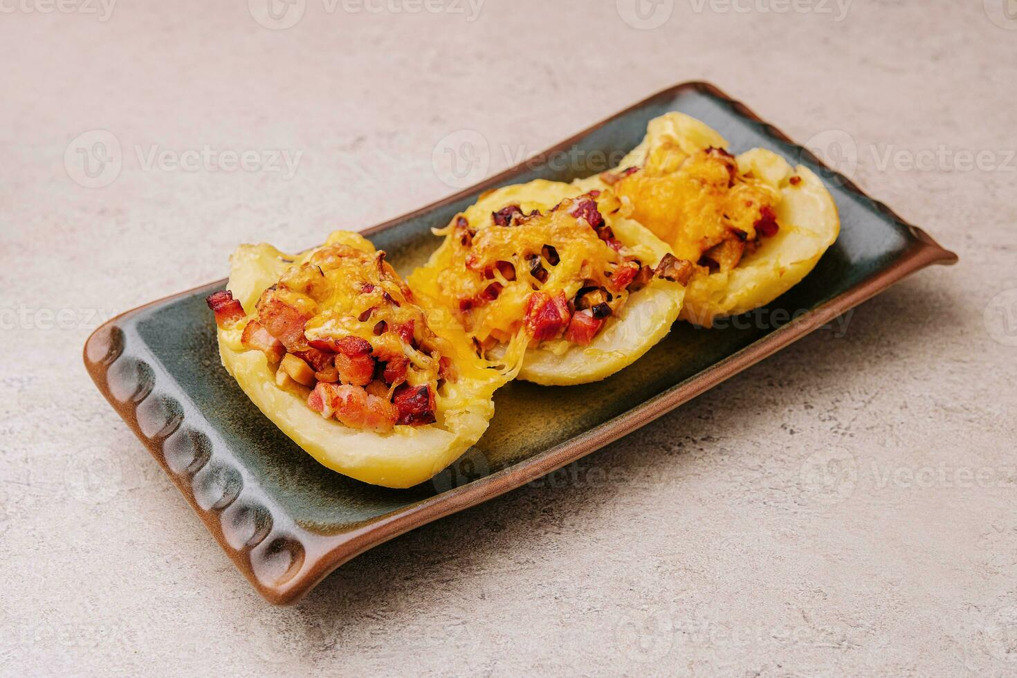 Baked stuffed bell peppers filled with bacon photo