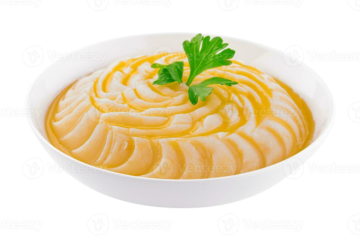Bowl with mashed potatoes on white background photo
