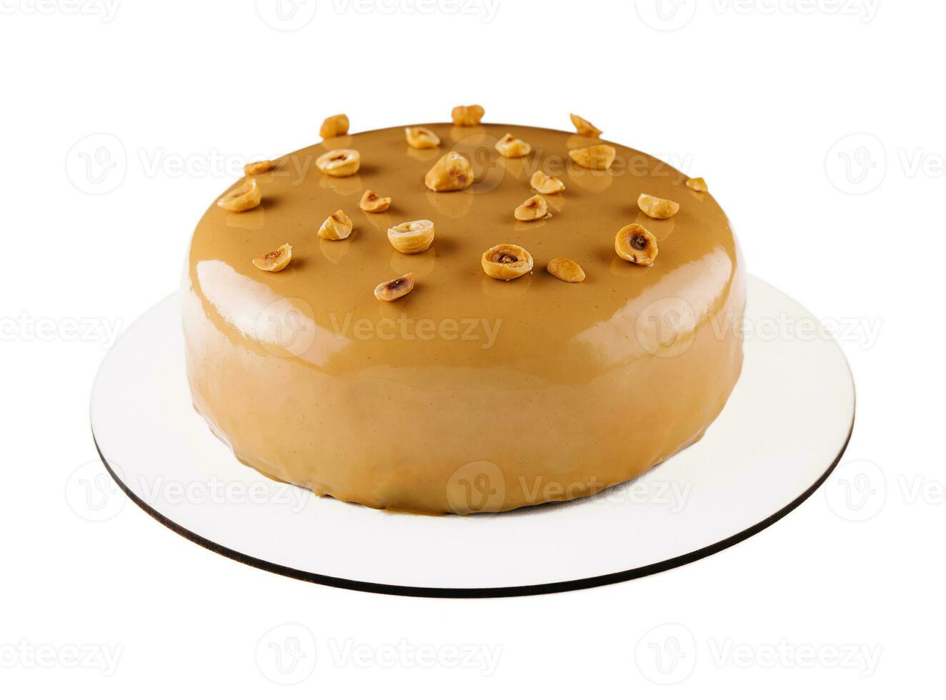 Sweet caramel cake with hazelnut and moouse photo