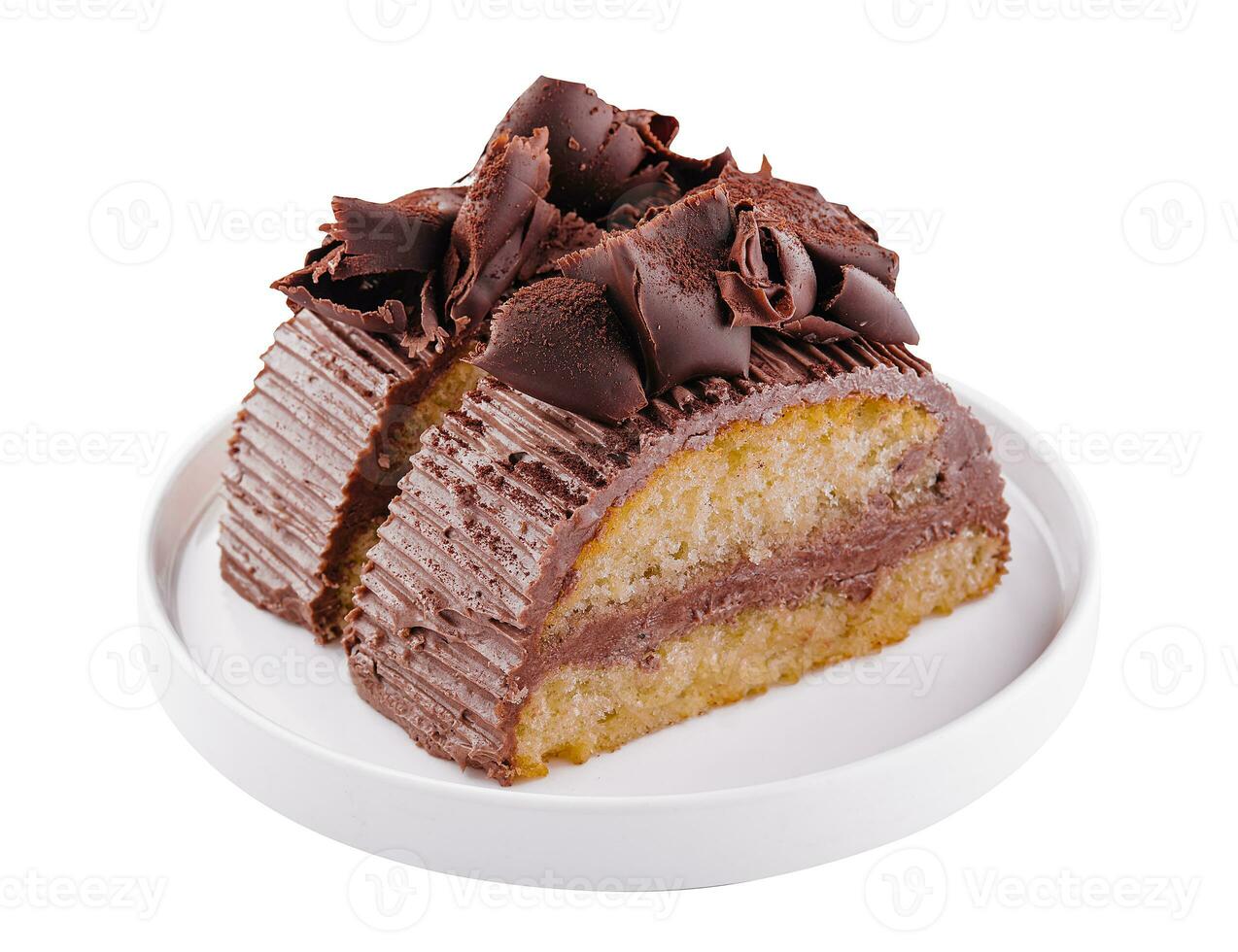 Chocolate roll with cream on a white plate photo