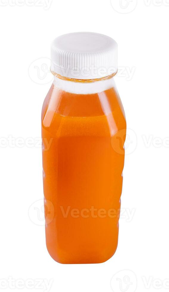 Carrot juice bottle on white background photo