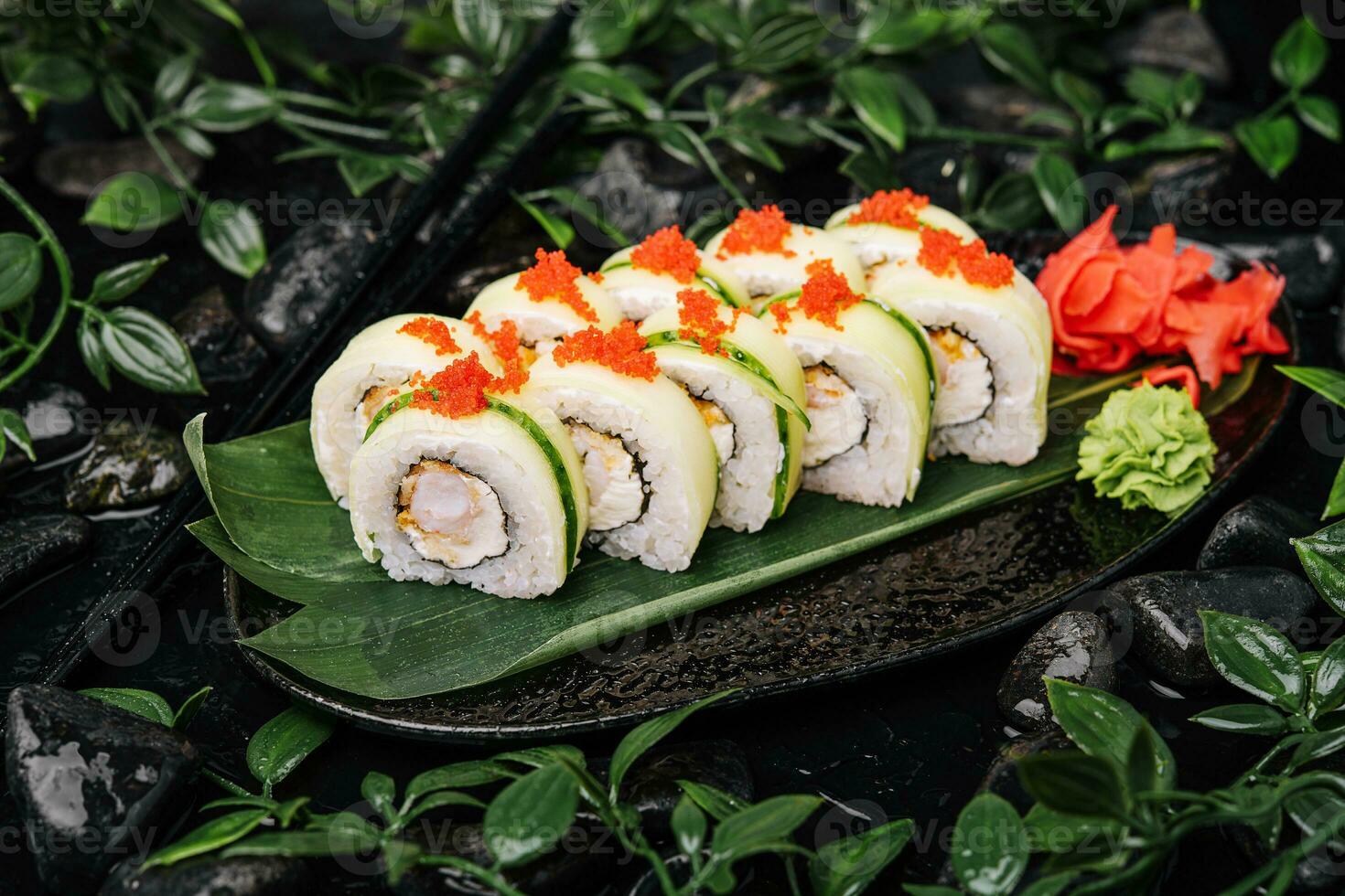 Sushi set with cheese, rice, shrimp and cucumber photo