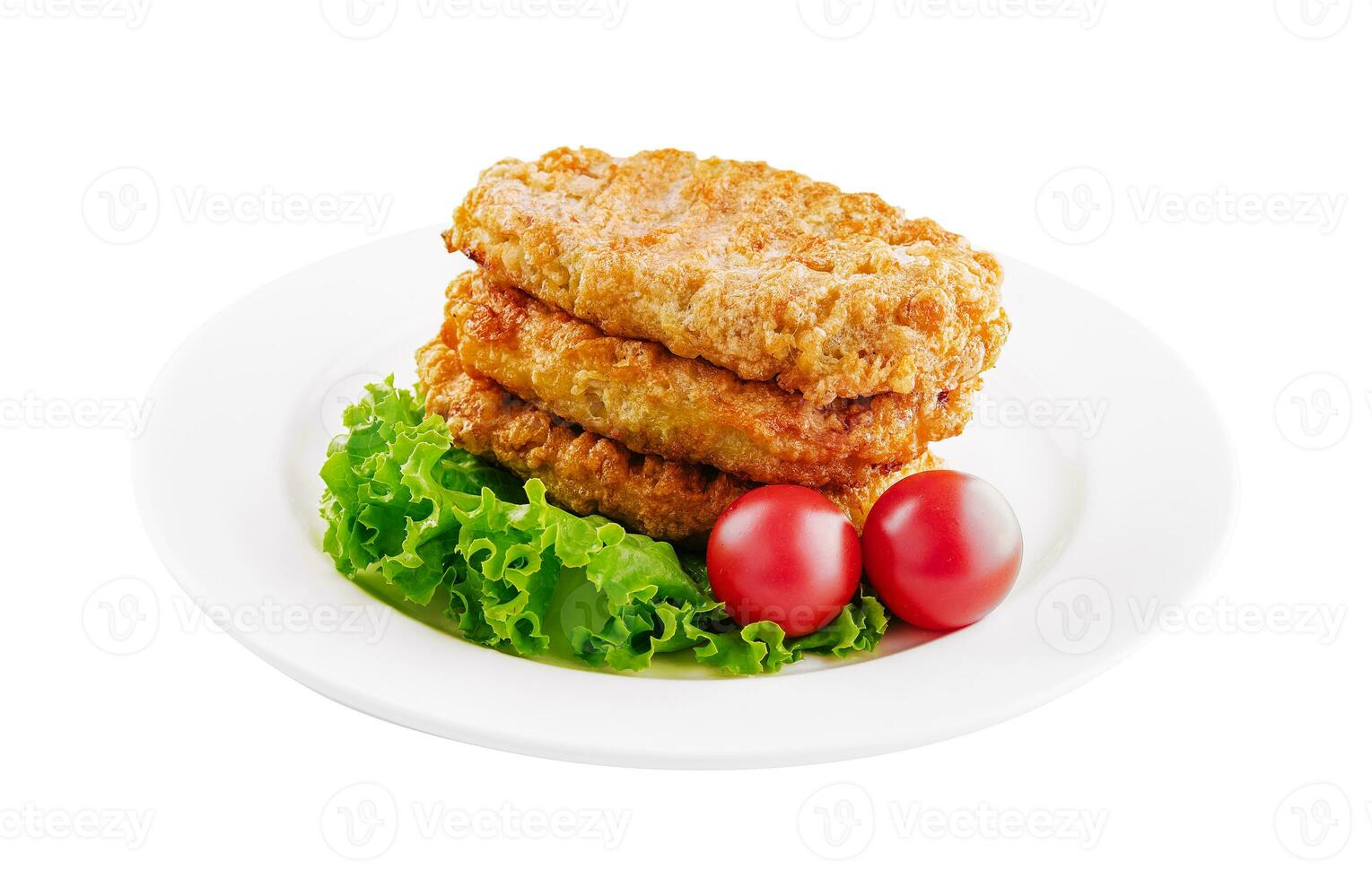 freshly baked chicken cutlets on plate photo