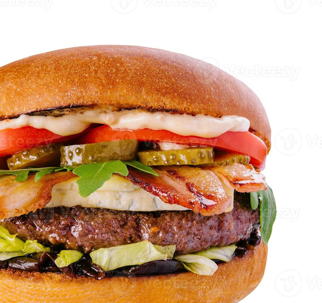 Bacon cheese burger with beef patty tomato cucumber photo