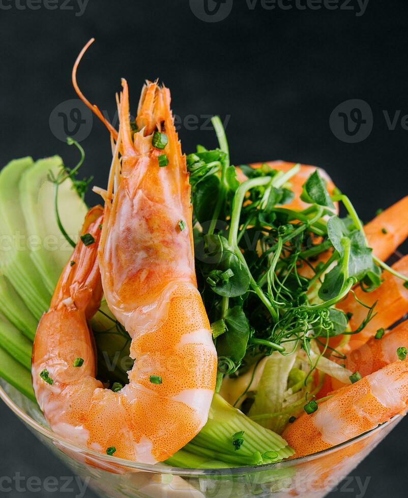 shrimp and avocado pieces in a martini glass photo