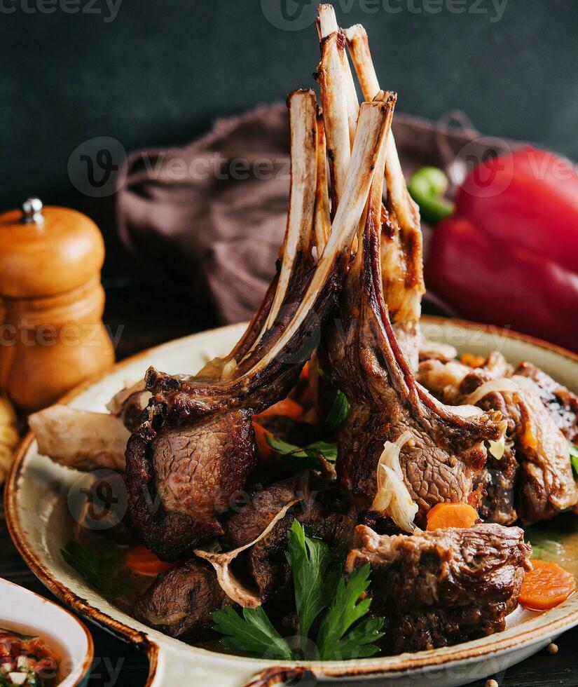 Roasted lamb chops with vegetables photo