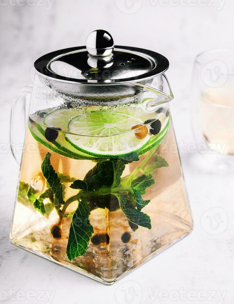 Detox water in a glass jug photo