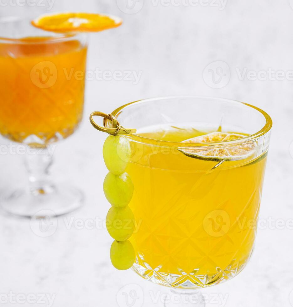 Fresh fruit tropic cocktail with grapes photo