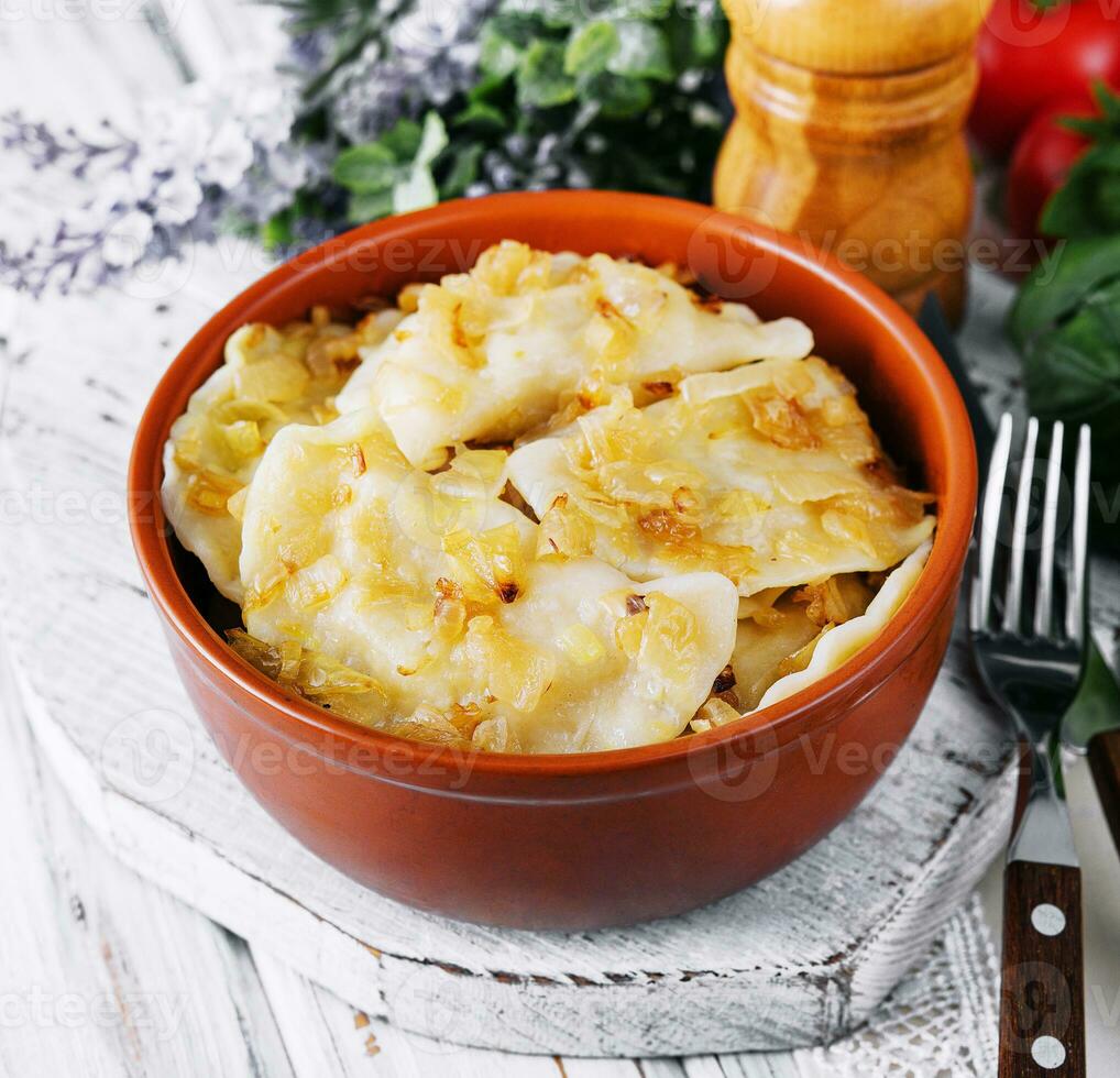 Dumplings, filled with mashed potatoes and onions photo