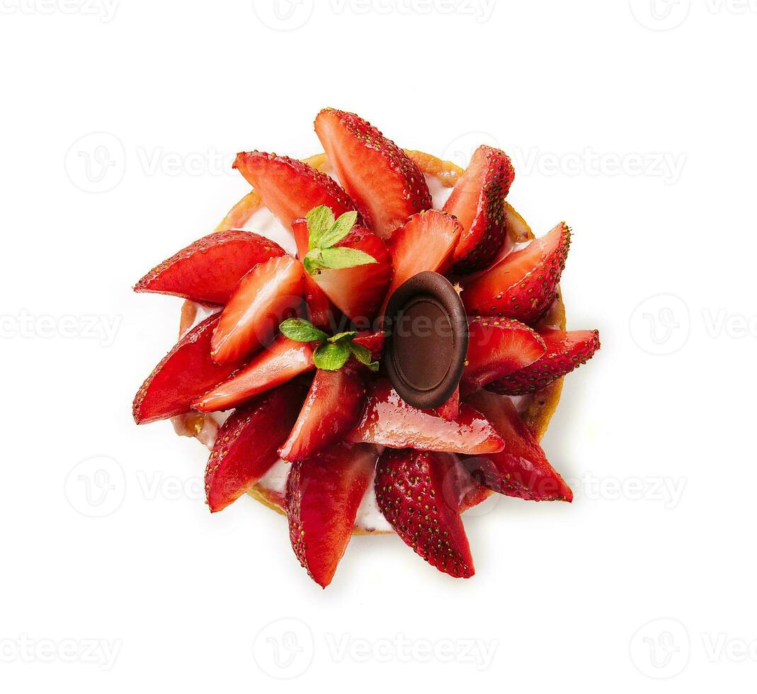 Delicious mini tart with strawberries and cream photo