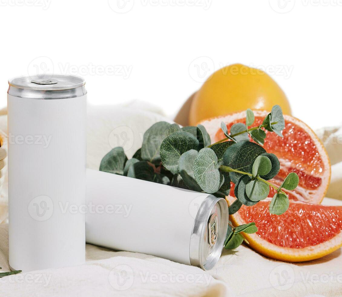 soda in a tin with oranges, grapefruits and pomegranate photo