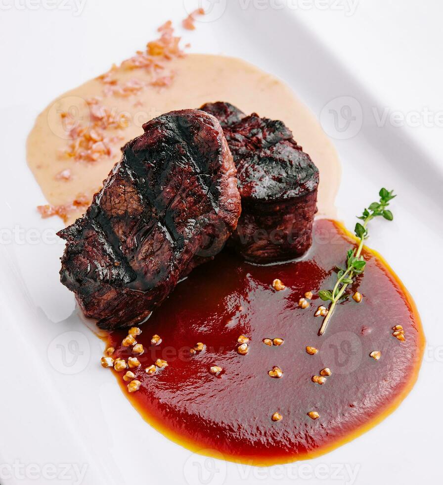 Delicious grilled fillet mignon at the restaurant photo