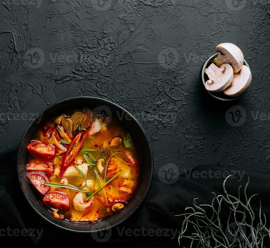 Tom Yum Goong - Thai hot and spicy soup photo