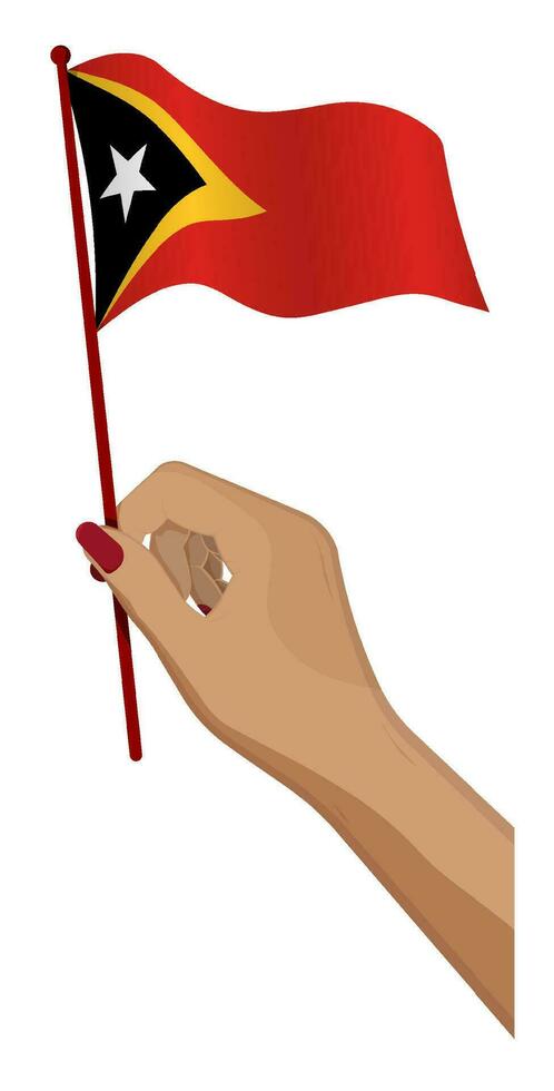 Female hand gently holds small flag of East Timor. Holiday design element. Cartoon vector on white background