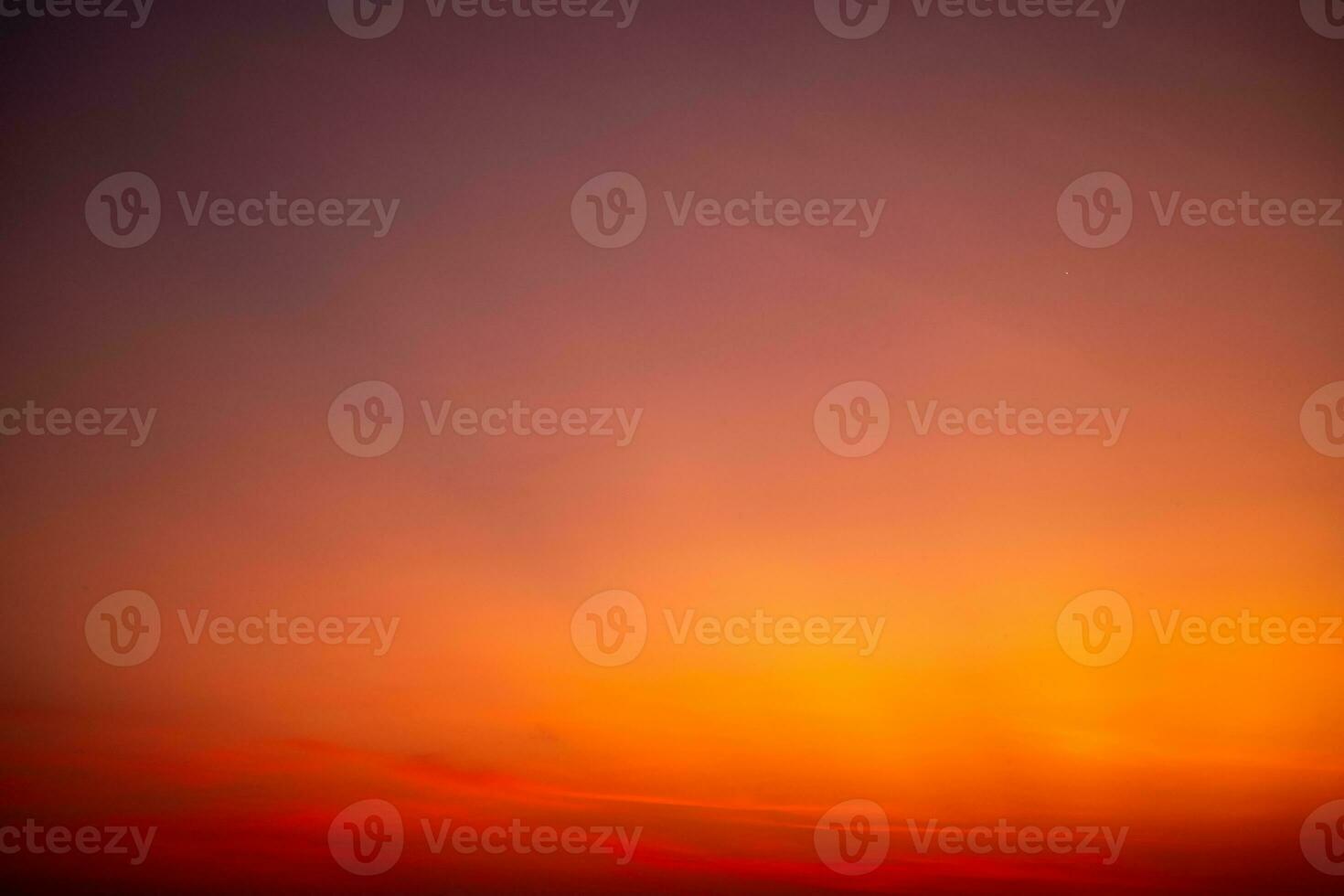 Beautiful luxury soft gradient with orange gold clouds and sunlight on the blue sky perfect for the background, take in everning,morning,Twilight, high definition landscape photo
