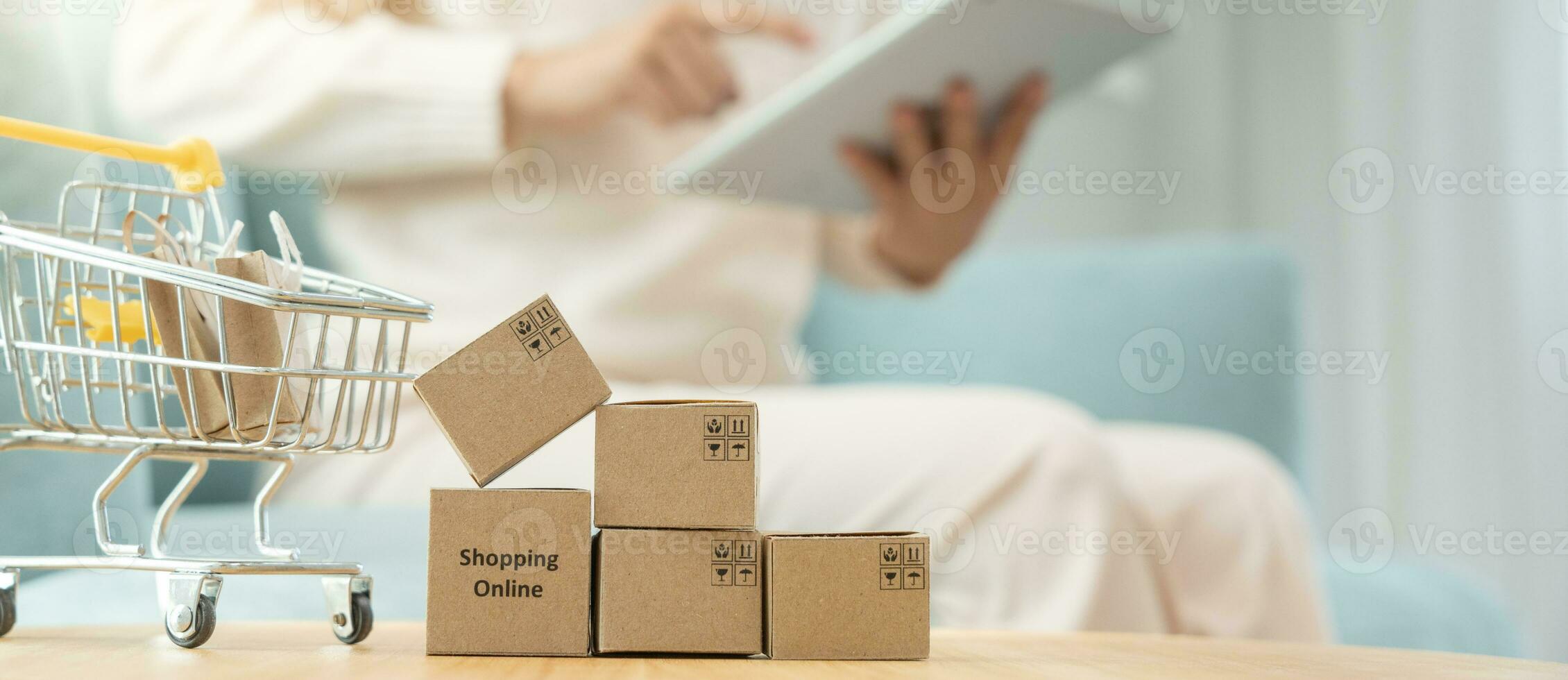 woman using tablet for online shopping at home. stay home, technology, electronic commerce, internet, market place, final or summer or big sale, payment, discount for credit, offer, Low price photo