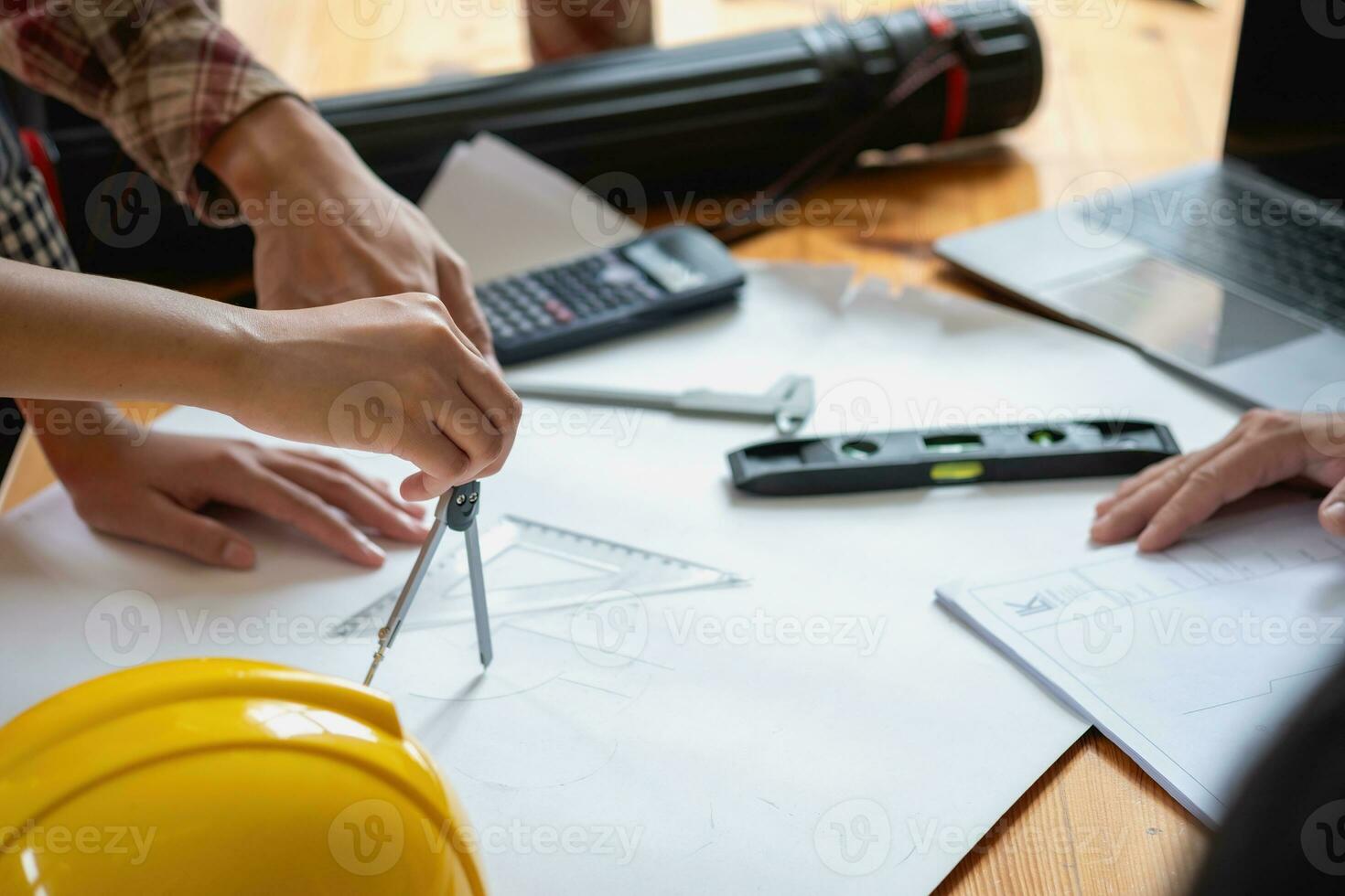 Concept meeting engineers or architects for projects working with partners and engineering tools to create models and blueprints at the job site. construction concept. Engineer concept. photo
