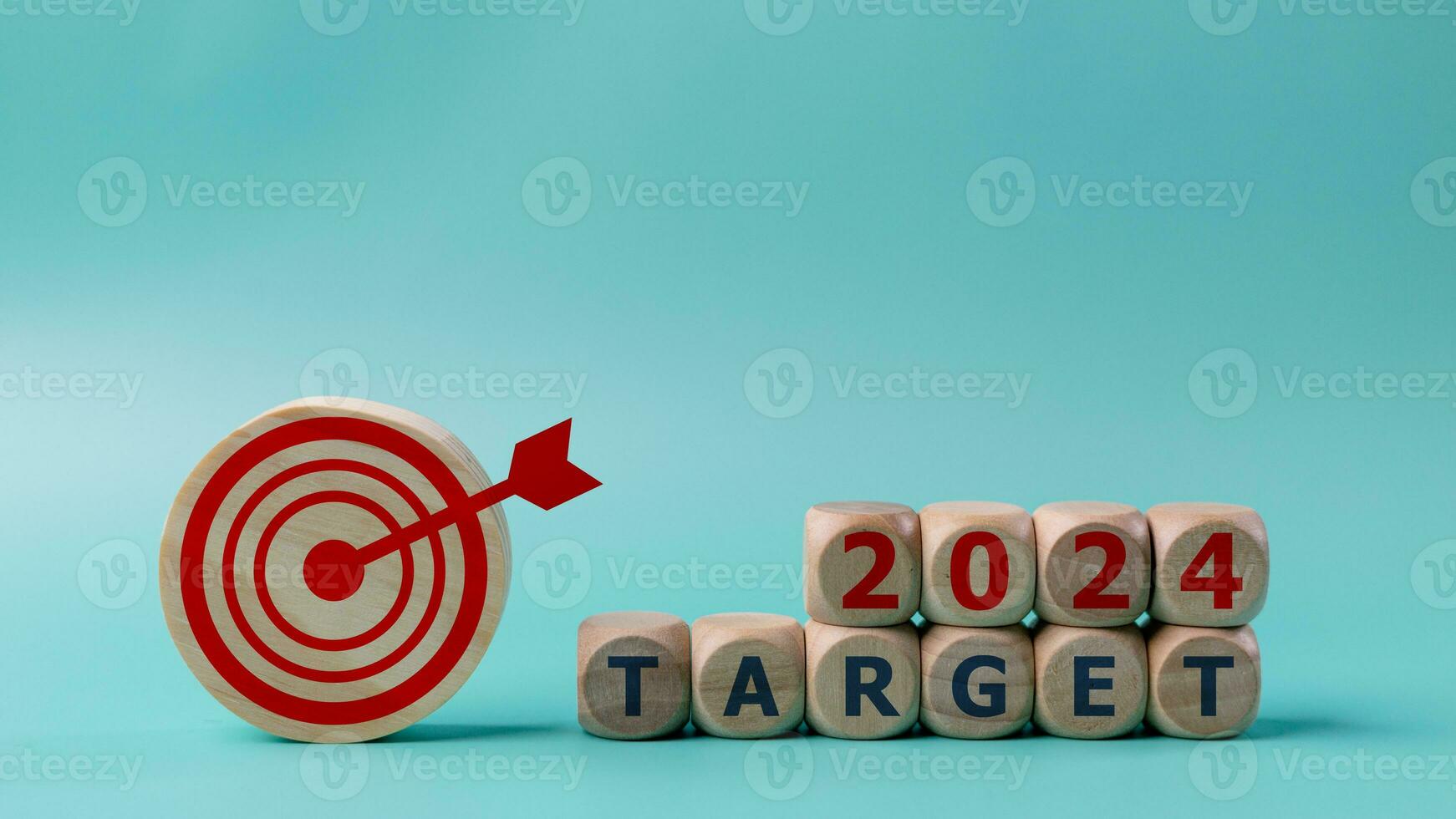Business target and dartboard with the word Target 2024 on blue