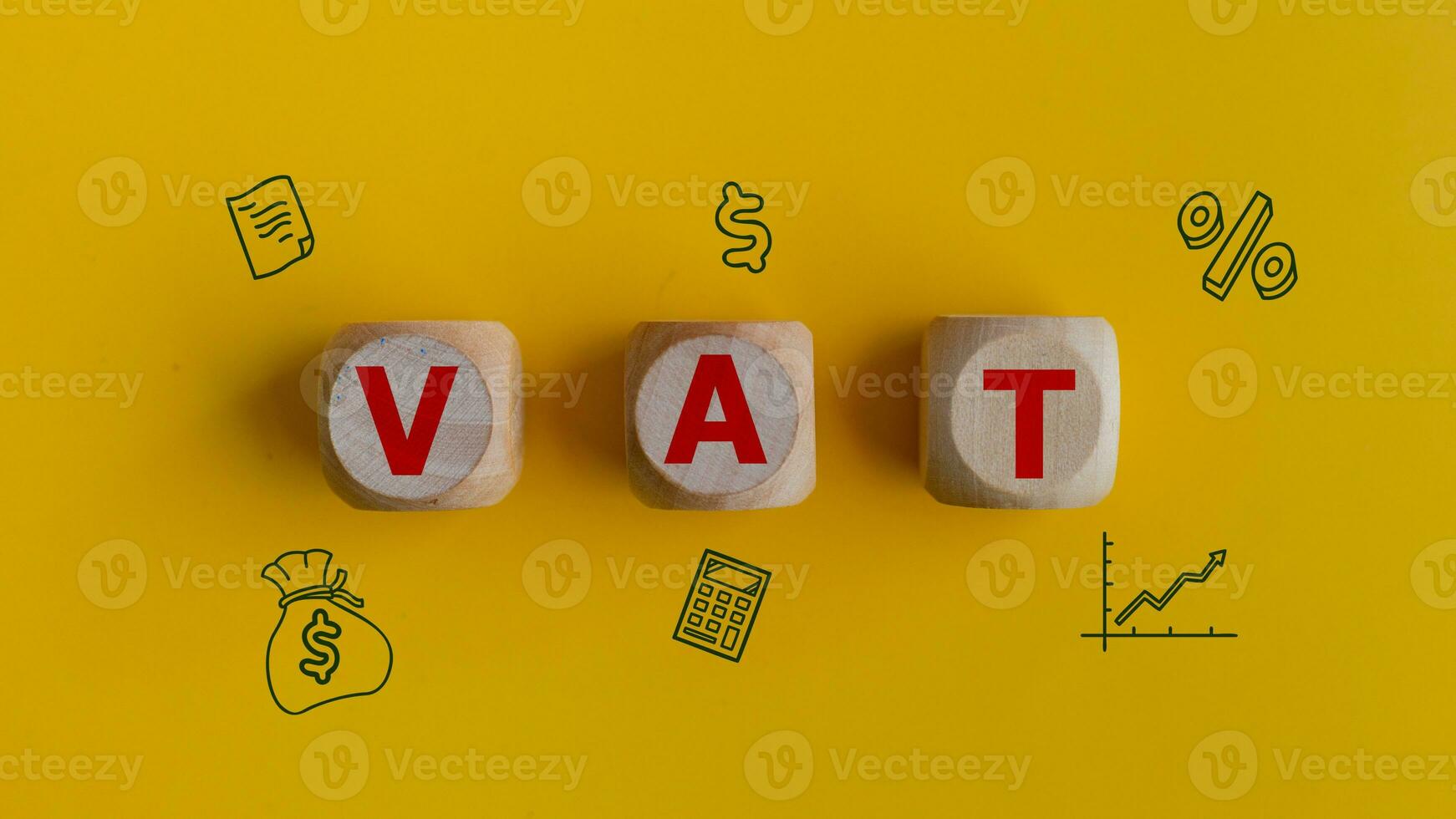 Vat business concept text on wooden cubes and icon on a yellow background. photo