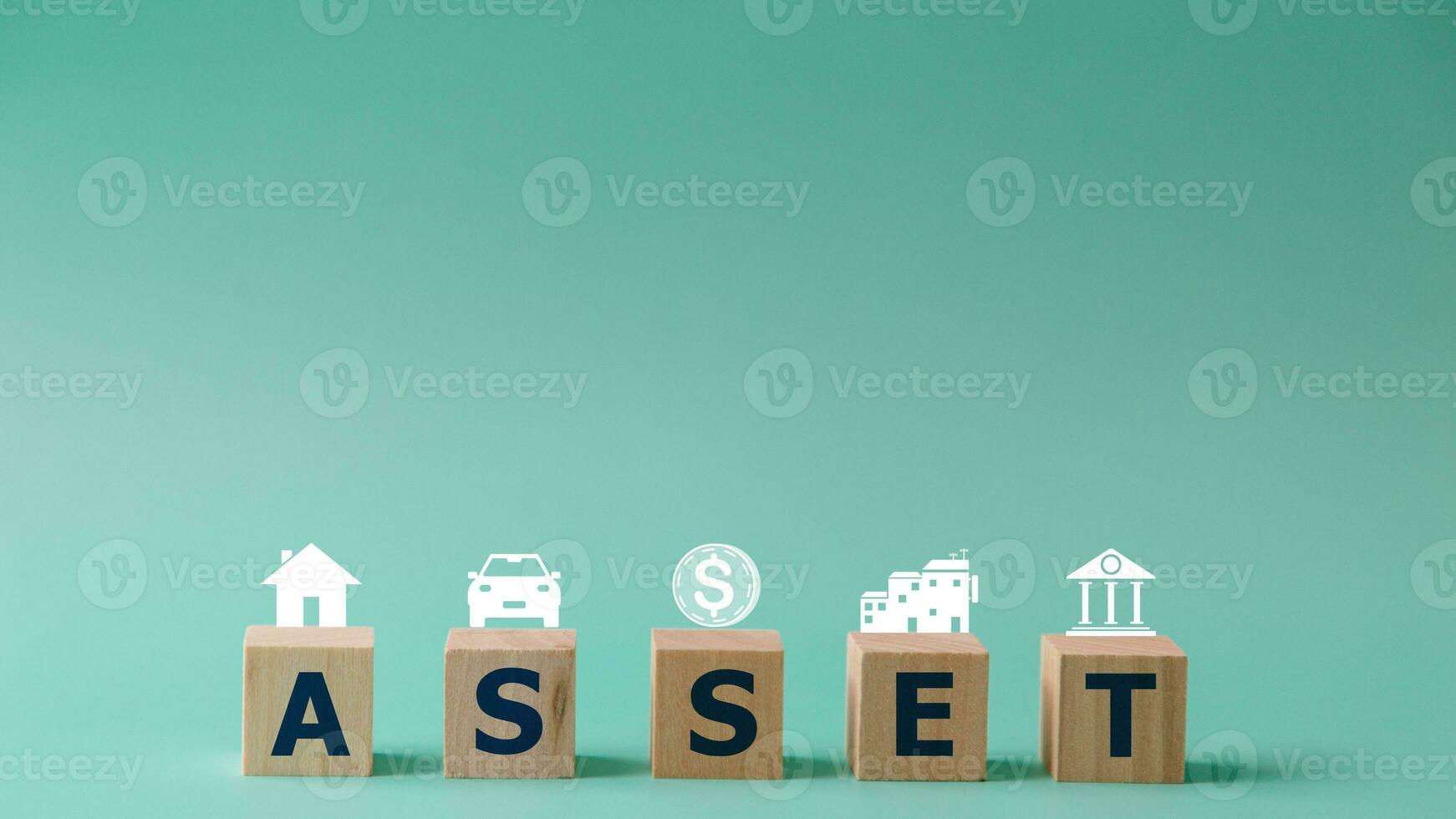 Wooden cubes with assets icon on background, Asset management and financial accounting, House and property investment and asset management, Interest rates, Loan mortgage photo