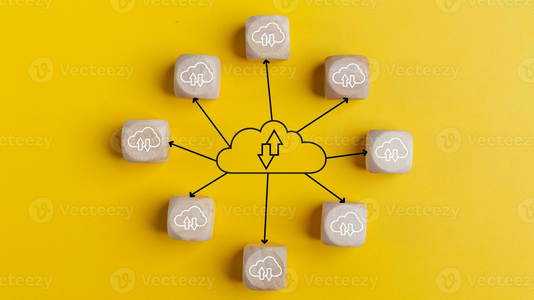 Cloud computing concept with wooden cubes on a yellow background. Top view. Cloud technology. Data storage. Networking and Internet service concept. photo