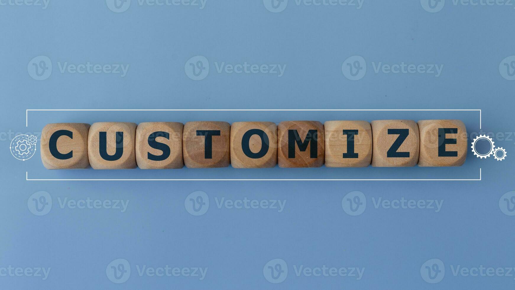 Customize word and tools icons on wood block. customize word is made of wooden building blocks lying customize, business concept, on a blue background photo