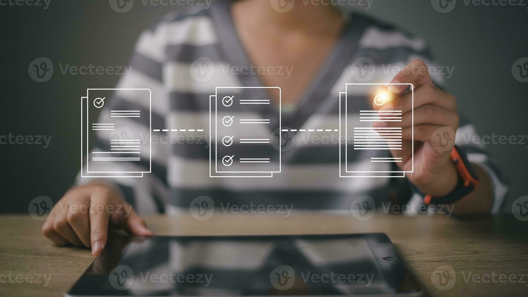Women touching on virtual screen to tick mark documents for online approve paperless quality assurance and ERP management. Prepare check and approve concepts. Document management, paperless. photo