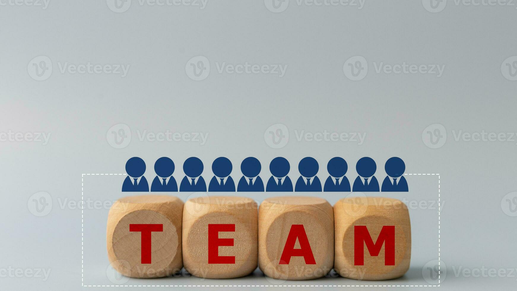 Wooden cube with a business team icon with the word team. Business teamwork and synergy concept. photo