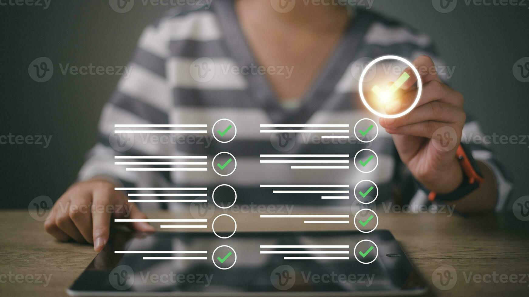 Businesswomen do online checklist surveys, Checkmarks on checklists, and fill out online forms or answer questions. Business performance checklist, evaluation, online survey, and online exams. photo
