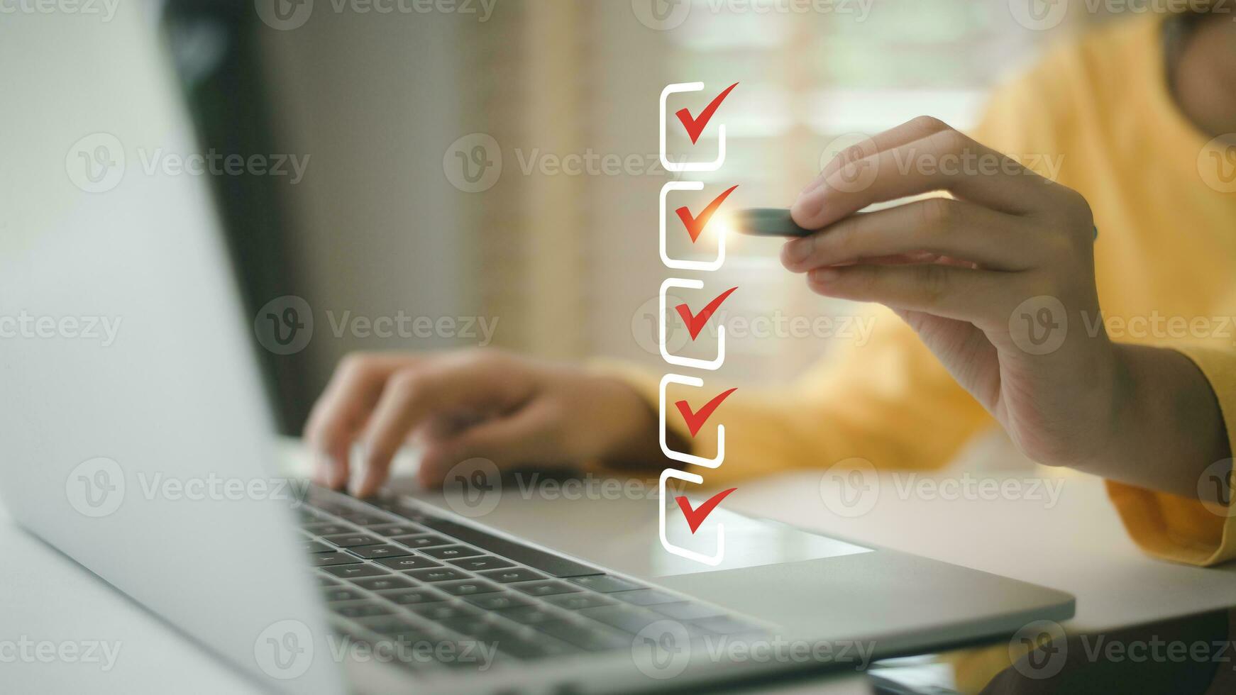 Women use pens to tick the correct sign mark in the checkbox for the quality document control checklist and business approves project concept. photo
