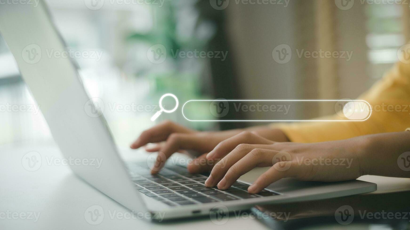 Women use laptop computers to search for data information. Optimize searching process with your website to expand company visibility in organic search results. Search Engine Optimization or SEO. photo