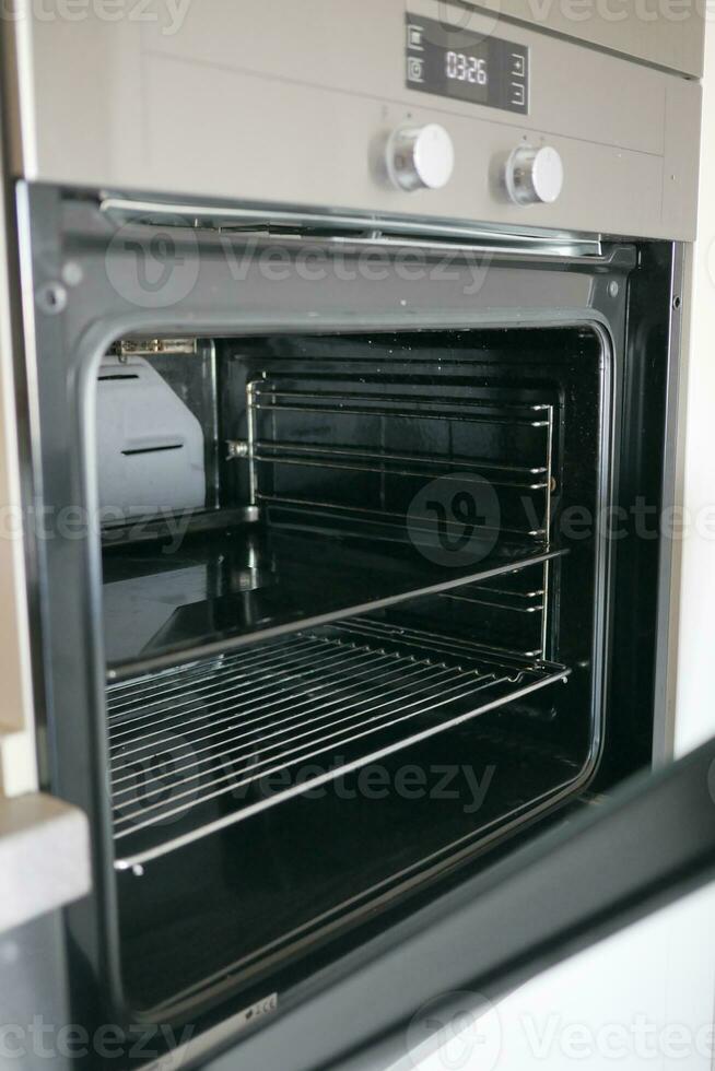 open electric oven at home photo