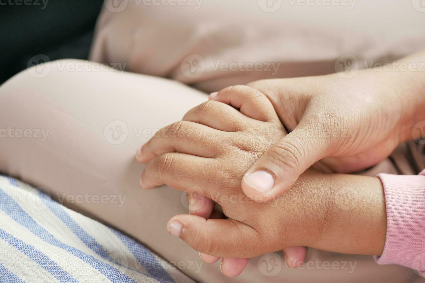 father holding hand of baby child, close up . photo