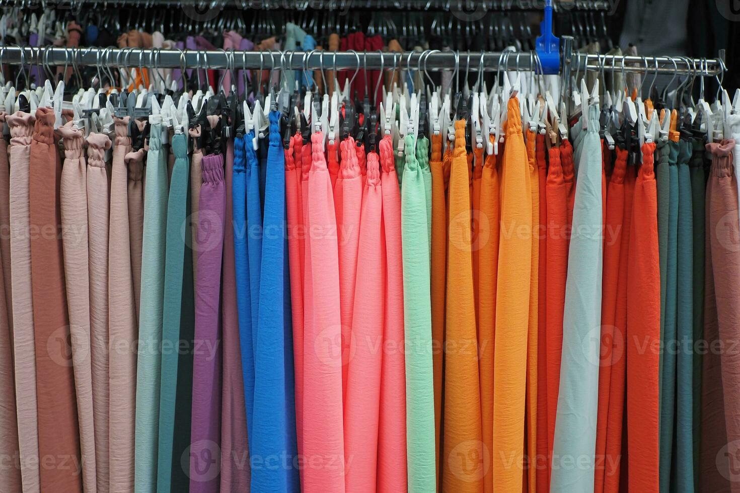 close up of many women cloths display for sale photo