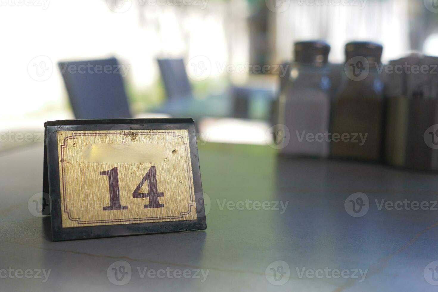 14 number sign number on cafe table . photo