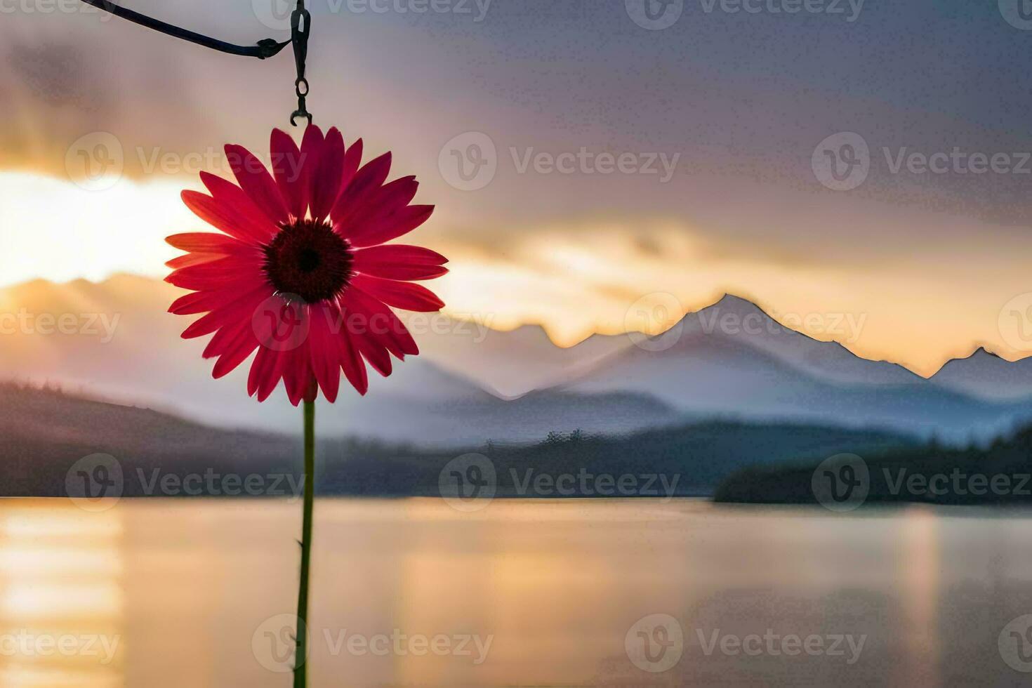 a red flower hanging from a hook in front of a lake. AI-Generated photo