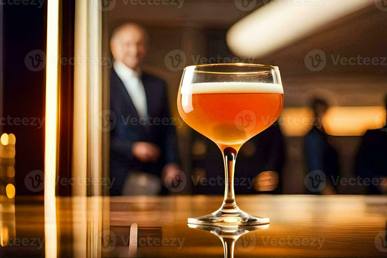a glass of beer sitting on a table in front of a man. AI-Generated photo