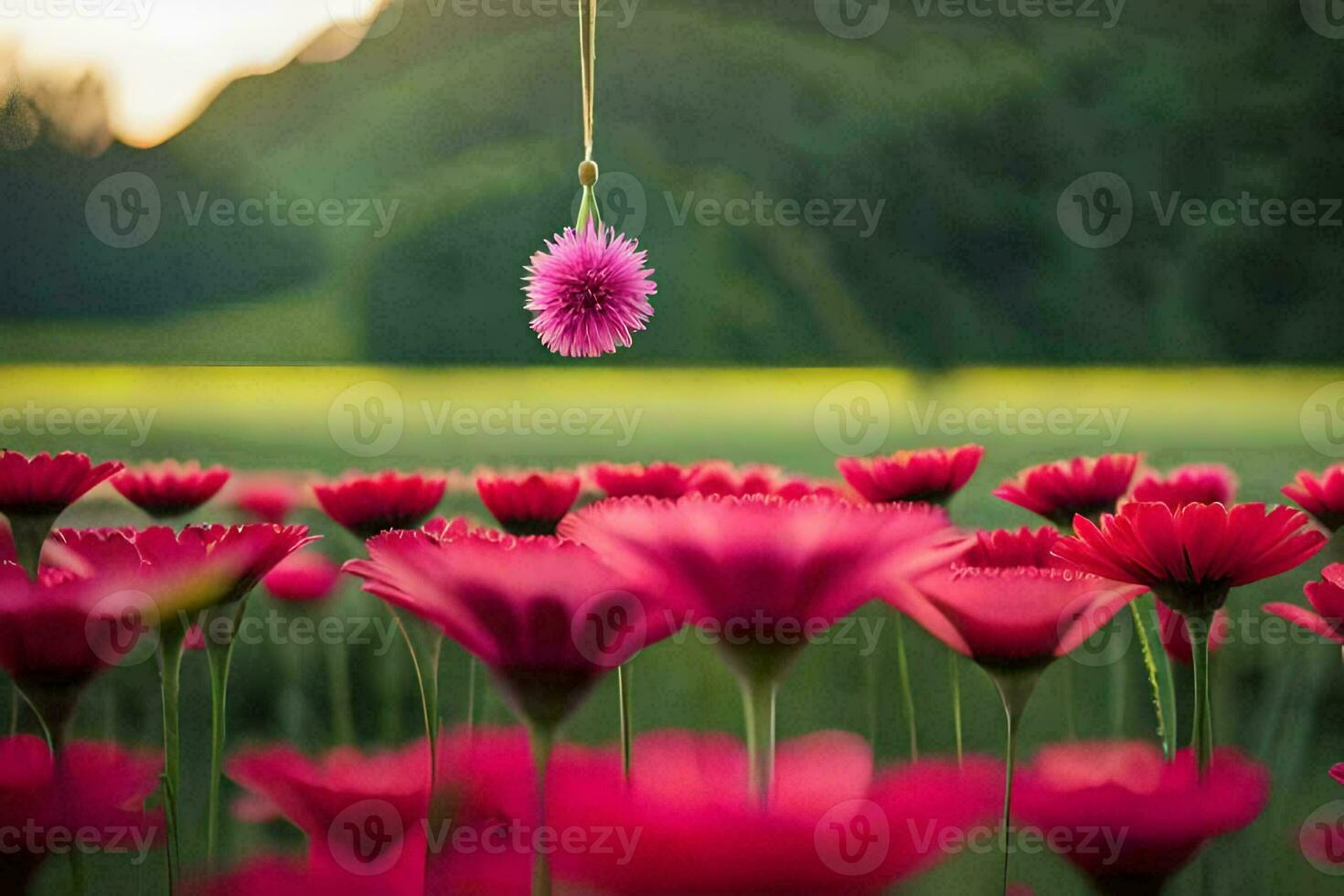 a pink flower hanging from a string in a field. AI-Generated photo