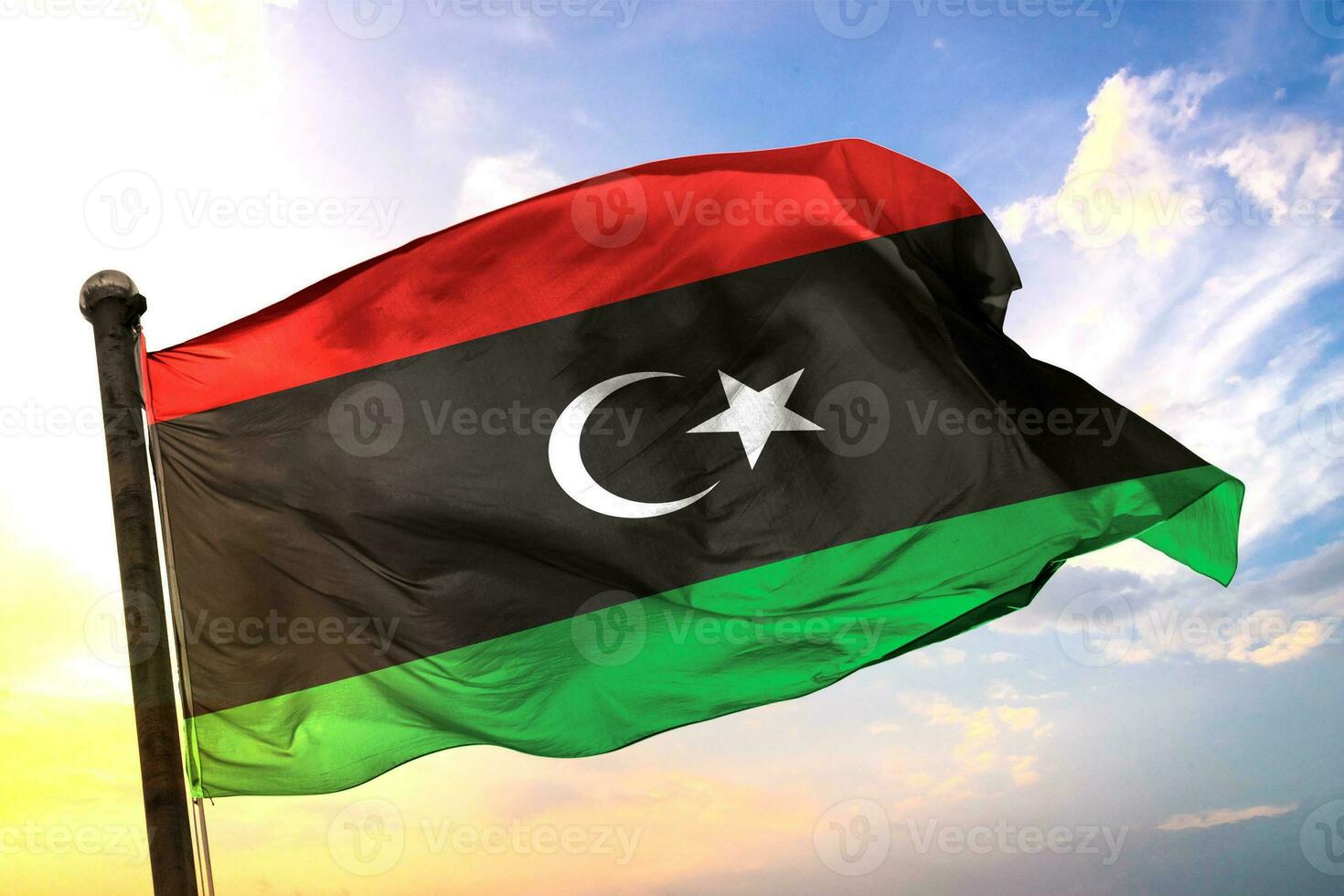 Libya 3D rendering flag waving isolated sky and cloud background photo