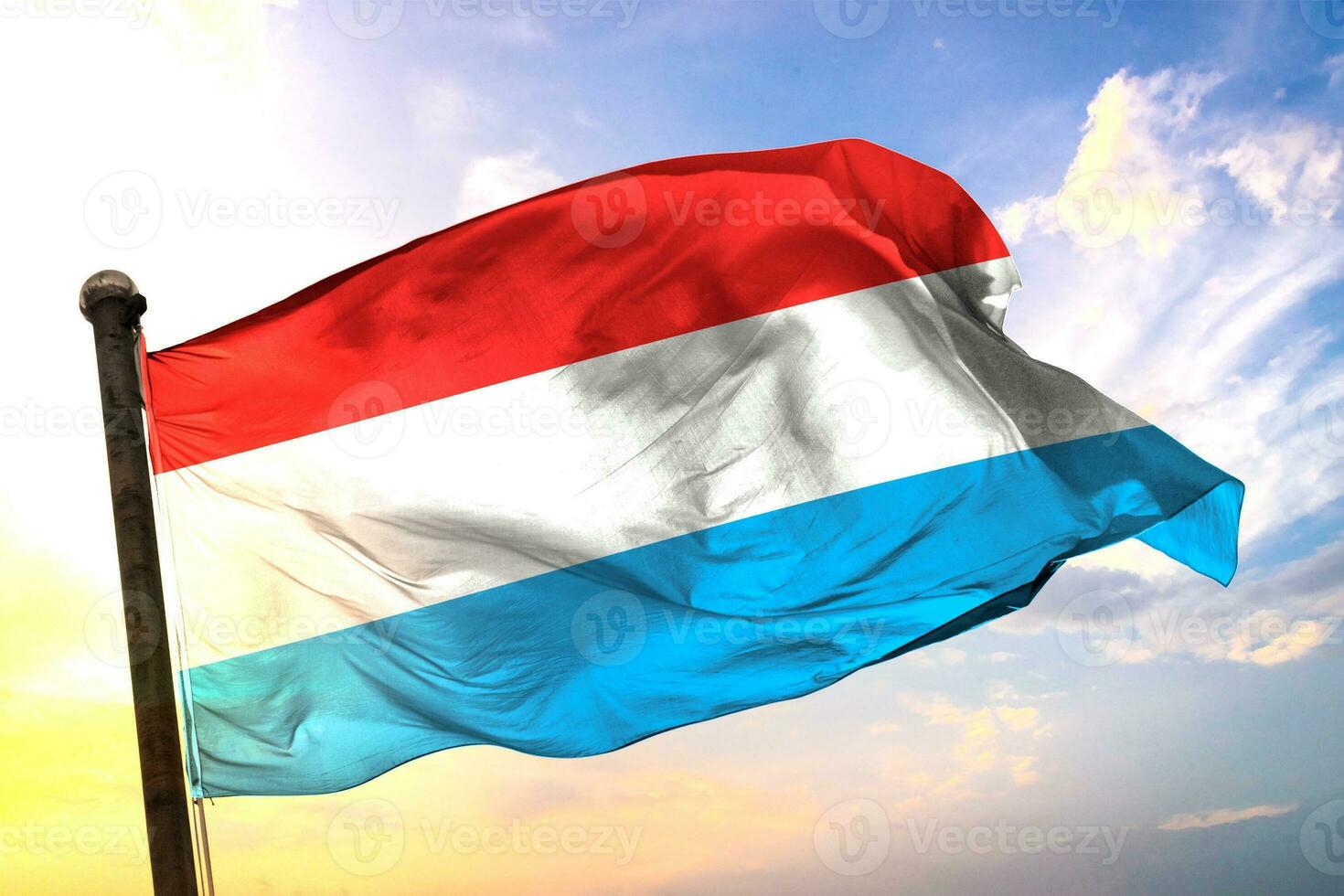 Luxembourg 3D rendering flag waving isolated sky and cloud background photo