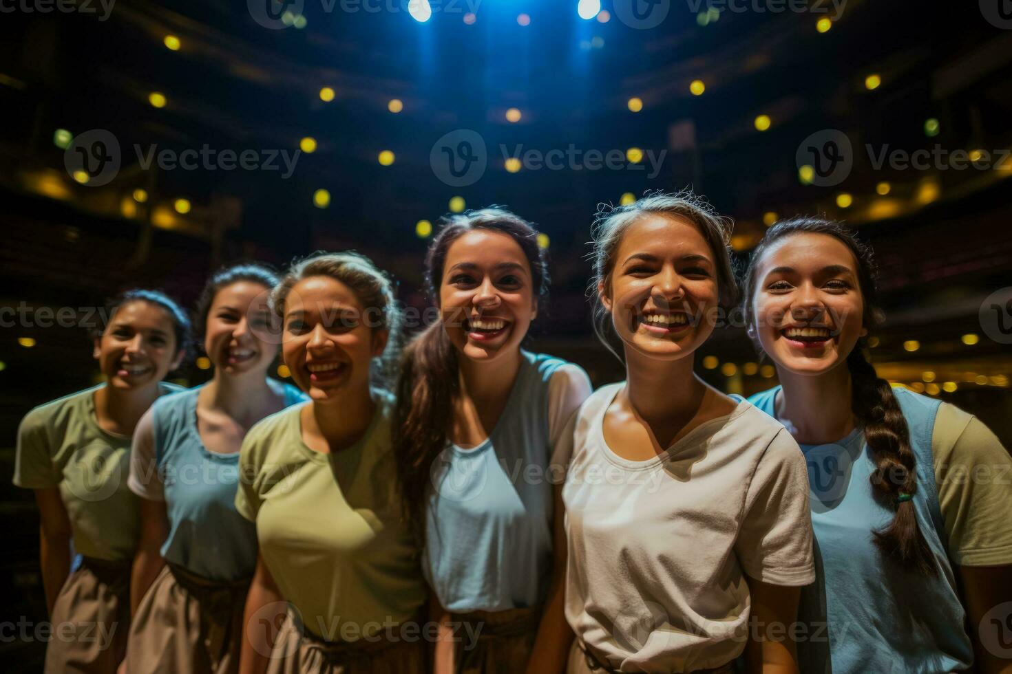 Young theater enthusiasts volunteering as ushers taking their first steps into the world of theater production photo