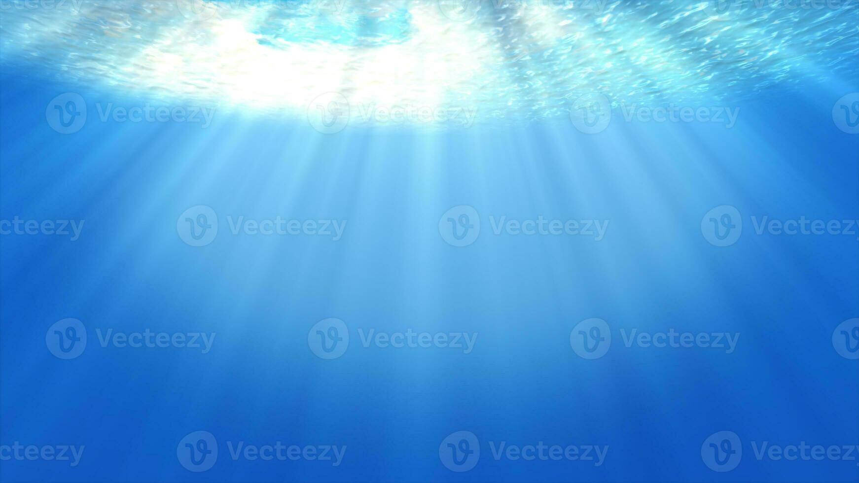 Sea Underwater light beautiful veil of sunlight. ocean waves underwater movement and flow with the rays.Beam shining from deep clear blue water causing a beautiful water lighting reflections.footage photo