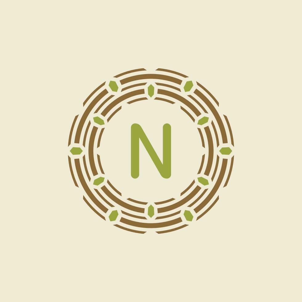Initial letter N ornamental border circle frame logo vector