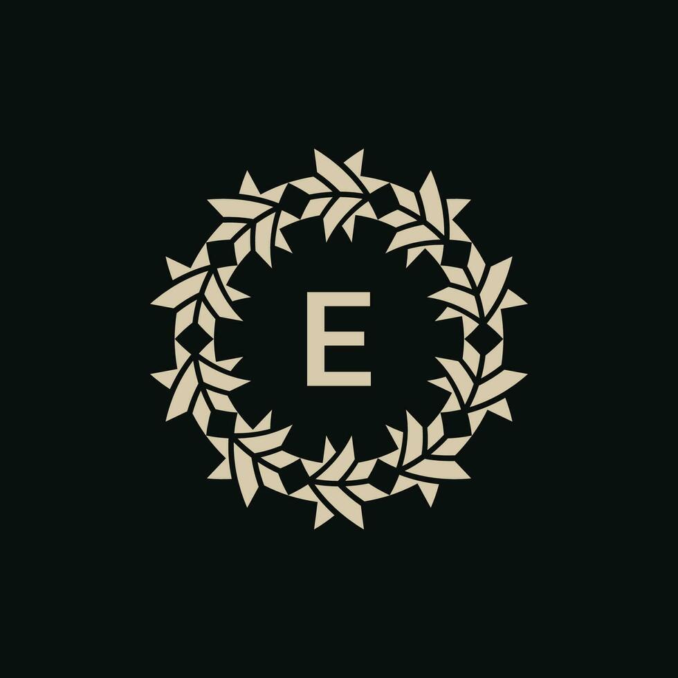 Initial letter E ornamental border circle frame logo vector