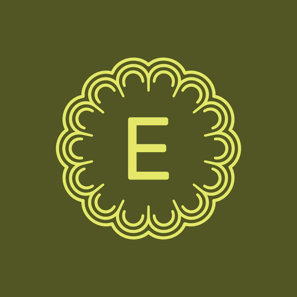 initial letter E floral alphabet circle emblem badge logo vector