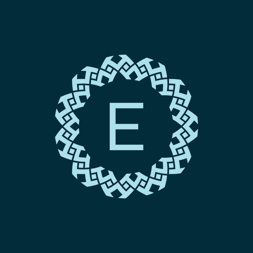 initial letter E ornamental emblem frame circle pattern logo vector