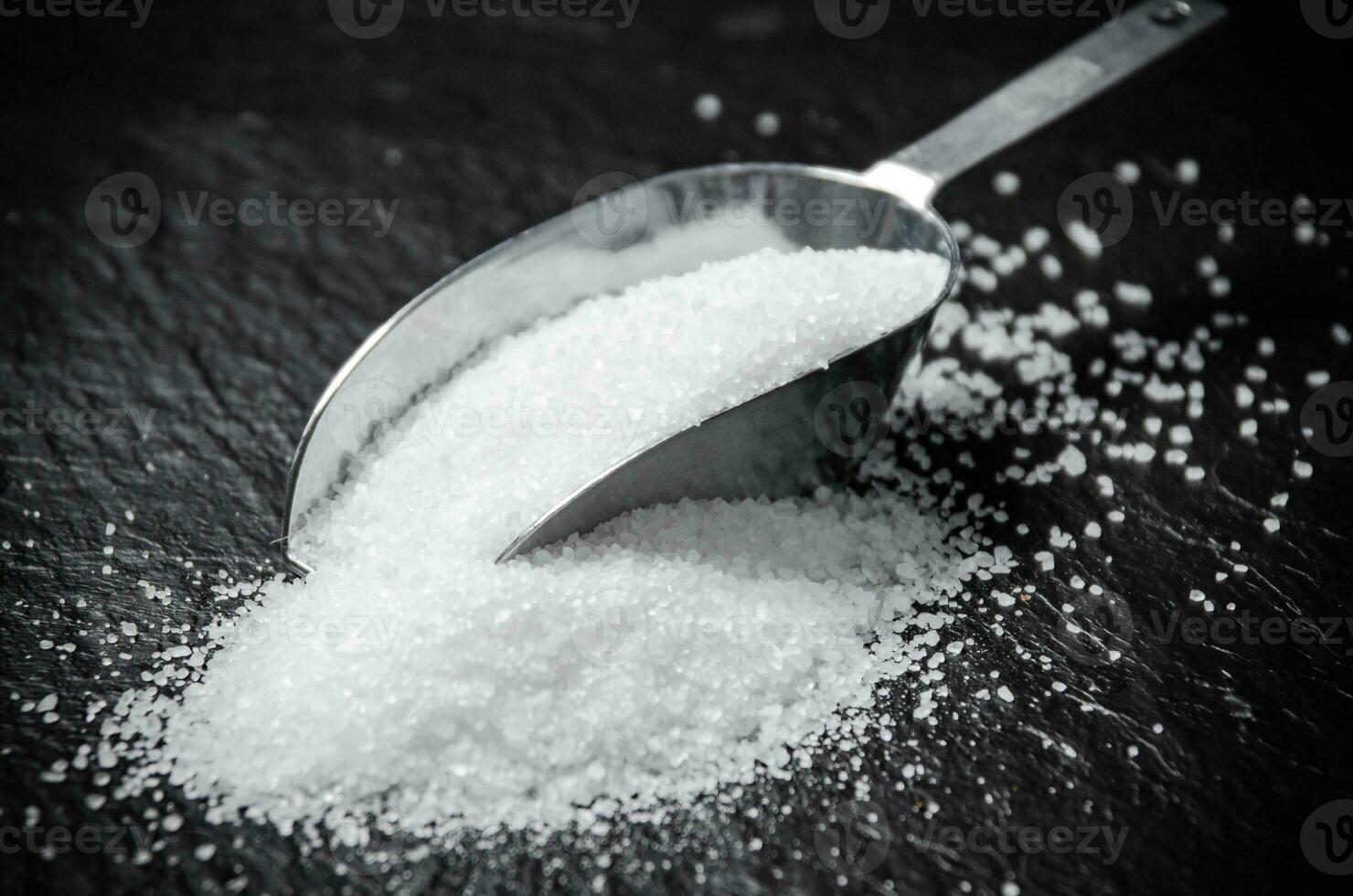 Salt background . On black table. photo