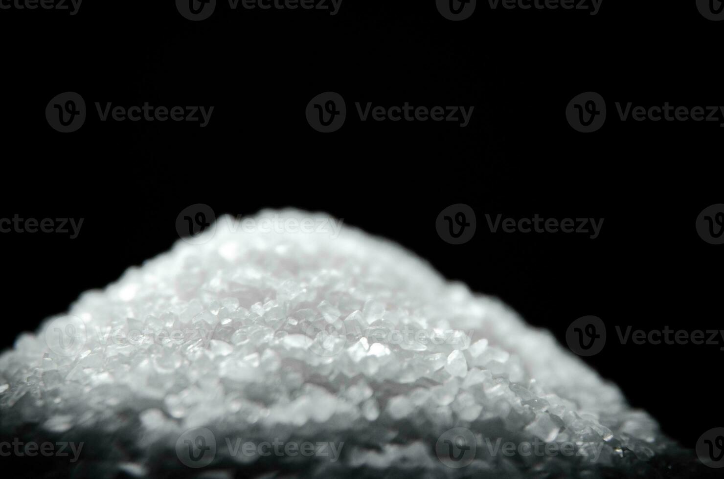 Salt background . On black table. photo