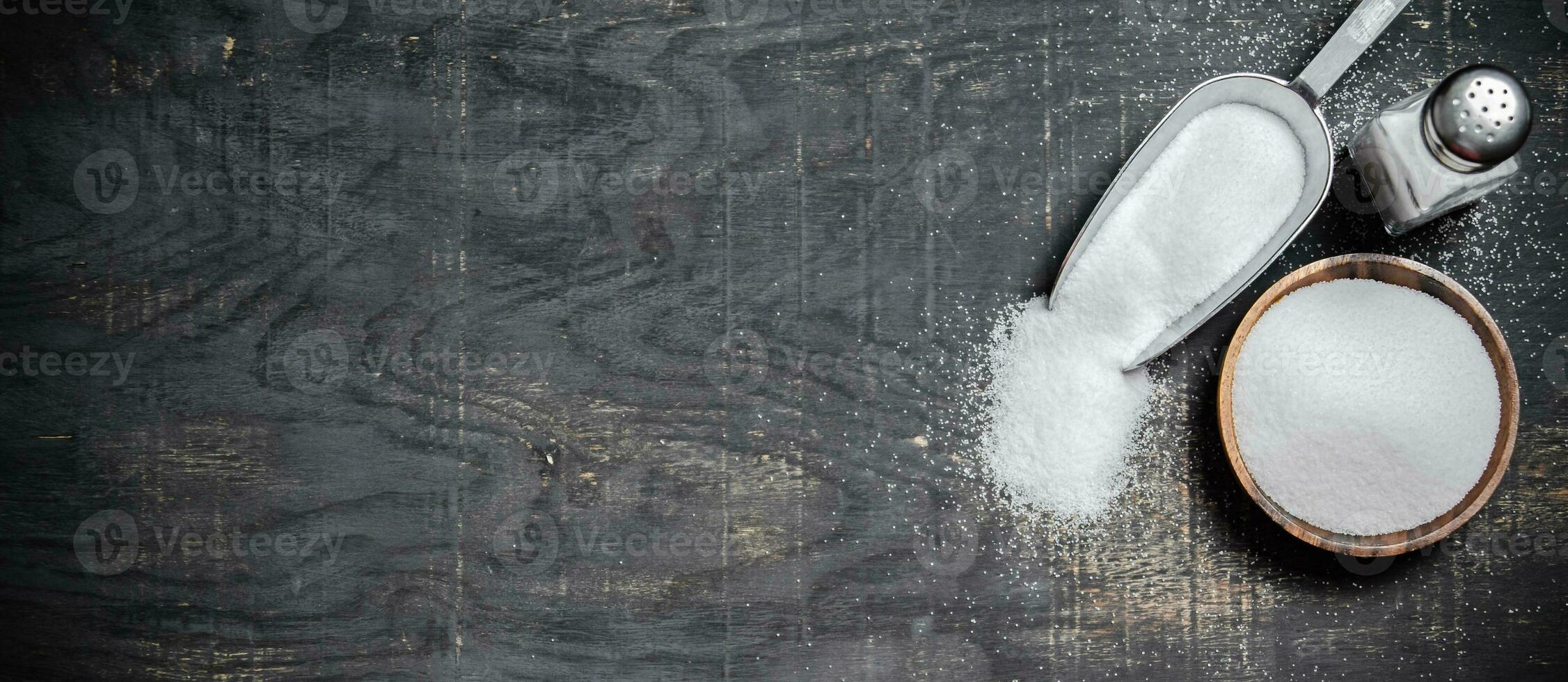 Salt background . On black table. photo