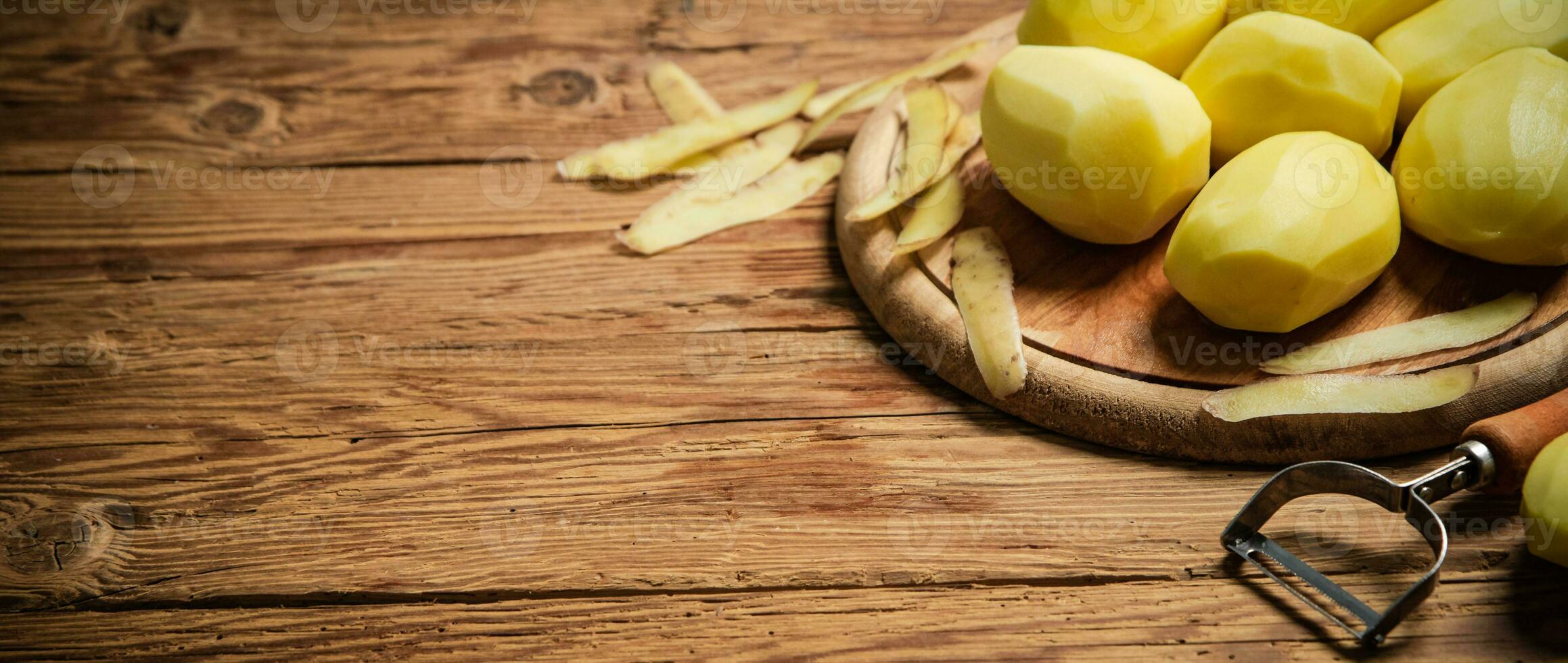 Fresh peeled potatoes. photo